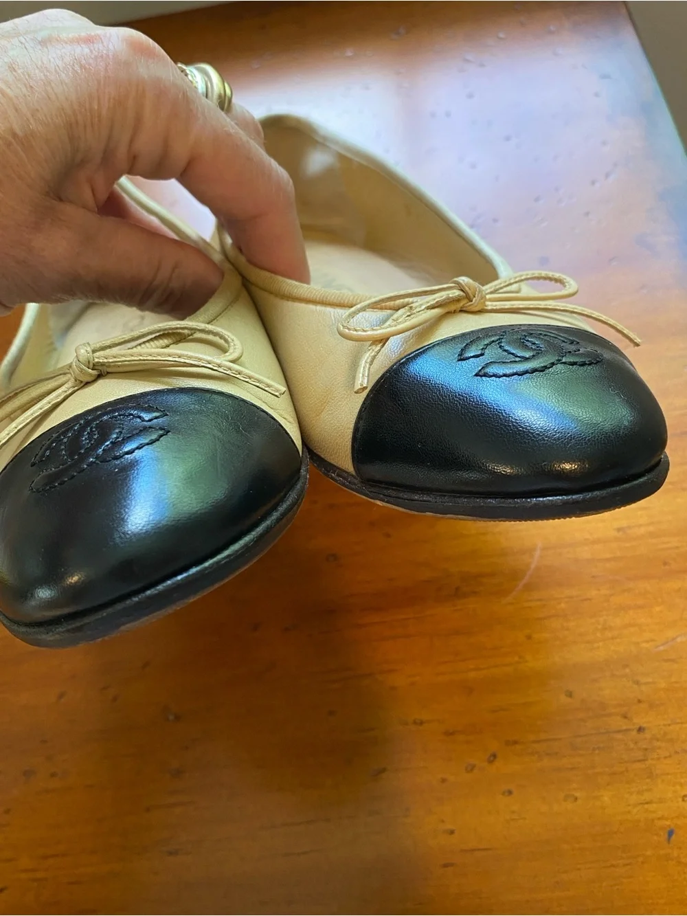 CHANEL Beige and Black Cap-Toe Leather Ballet Flats